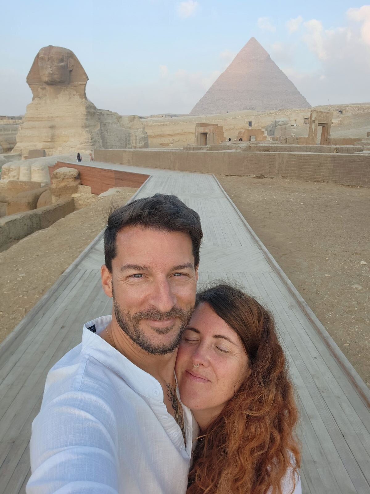 Britton and Carolee in front of the Sphinx and pyramids